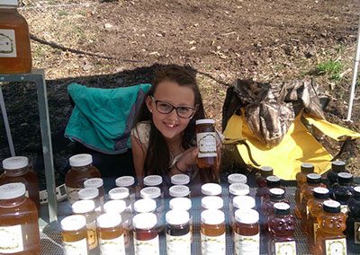 Beekeepers Daughter farmers market stand