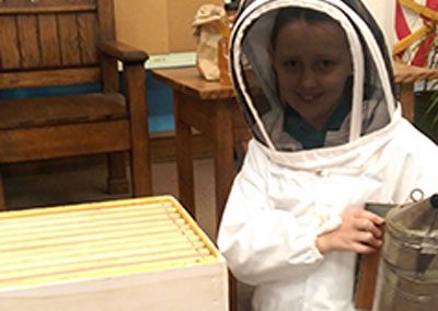 young beekeeper at work